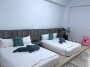 Postel nebo postele na pokoji v ubytování Memories Homestay