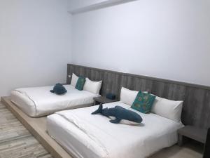 Postel nebo postele na pokoji v ubytování Memories Homestay