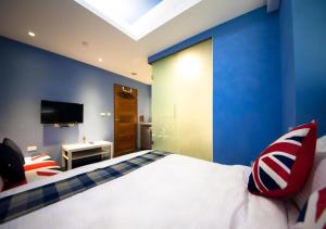 Llit o llits en una habitació de 羅東夜市EazyRoom