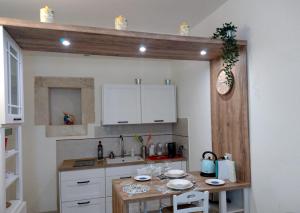 Kuchyňa alebo kuchynka v ubytovaní Ragusa exclusive flat with terrace & BBQ