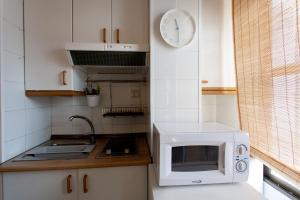 Kuchyňa alebo kuchynka v ubytovaní PIKIS Apartment center 1