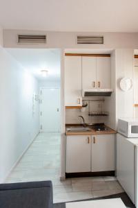 Kuchyňa alebo kuchynka v ubytovaní PIKIS Apartment center 1