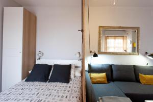 Posteľ alebo postele v izbe v ubytovaní PIKIS Apartment center 1