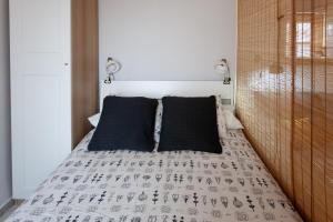 Posteľ alebo postele v izbe v ubytovaní PIKIS Apartment center 1