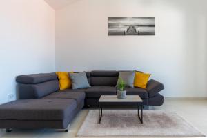 Posezení v ubytování SUNRISE ISLAND LOFT