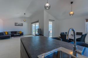 Posezení v ubytování SUNRISE ISLAND LOFT