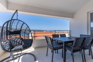 Balkón nebo terasa v ubytování SUNRISE ISLAND LOFT