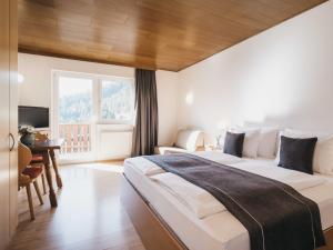 Łóżko lub łóżka w pokoju w obiekcie Haus Bellevue by VAYA inklusive Super Sommer Card