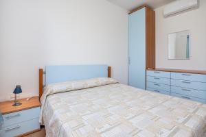 Posteľ alebo postele v izbe v ubytovaní Villetta Confortevole