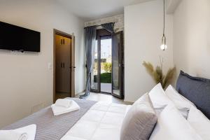 Postel nebo postele na pokoji v ubytování Stone Project Villa