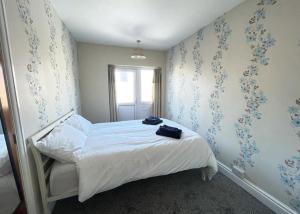 Postel nebo postele na pokoji v ubytování 1 Bedroom Holiday Apartment Skegness - Flat 14