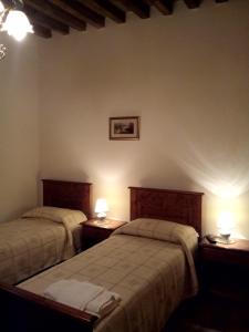 Posteľ alebo postele v izbe v ubytovaní Agriturismo La Crocetta
