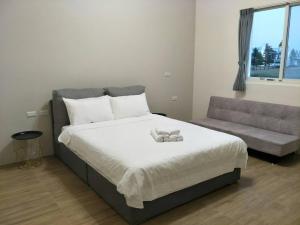 Postel nebo postele na pokoji v ubytování Good moment B&B