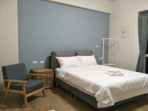 Postel nebo postele na pokoji v ubytování Good moment B&B