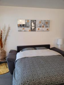 Postel nebo postele na pokoji v ubytování O logis du Port