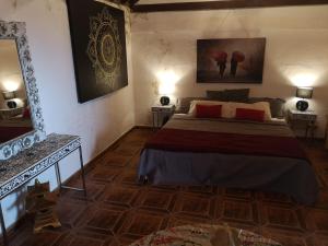Suite Zen y Cueva Refugio客房内的一张或多张床位