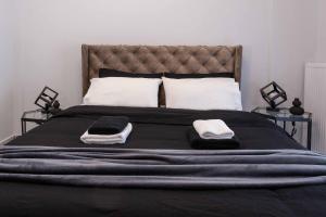 Ένα ή περισσότερα κρεβάτια σε δωμάτιο στο Palazzo Vista Suite&Spa