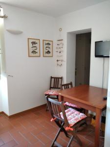 TV a/nebo společenská místnost v ubytování Voglia di mare + 37 fotografií