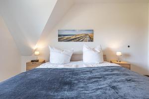Postel nebo postele na pokoji v ubytování Meer Appartement