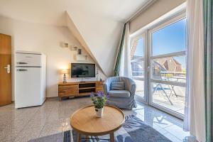 Kuchyň nebo kuchyňský kout v ubytování Meer Appartement