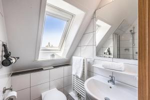 Koupelna v ubytování Meer Appartement + 37 fotografií