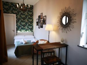 A bed or beds in a room at Marilor Apartments