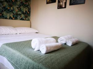 A bed or beds in a room at Marilor Apartments