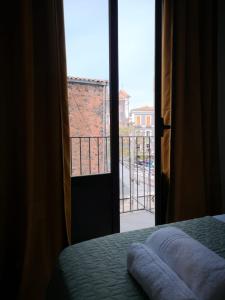 A bed or beds in a room at Marilor Apartments