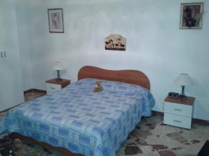 Apartment for family Mazara del Valloにあるベッド