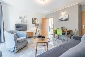 TV a/nebo společenská místnost v ubytování Meer Appartement