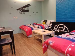 Postel nebo postele na pokoji v ubytování Star Moon Forest Inn