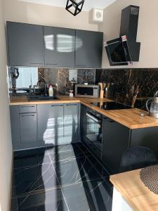 Kuchnia lub aneks kuchenny w obiekcie Apartamenty Danka
