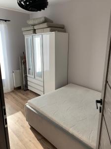 Posteľ alebo postele v izbe v ubytovaní Apartamenty Danka