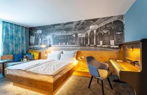 Postel nebo postele na pokoji v ubytování mightyTwice Hotel Dresden + 37 fotografií