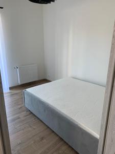 Łóżko lub łóżka w pokoju w obiekcie Apartamenty Danka