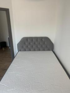 Łóżko lub łóżka w pokoju w obiekcie Apartamenty Danka