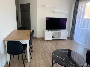 Telewizja i/lub zestaw kina domowego w obiekcie Apartamenty Danka