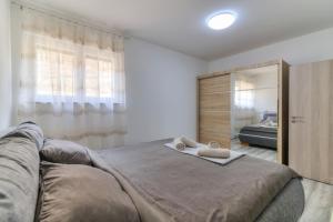 Postel nebo postele na pokoji v ubytování Apartment Luka