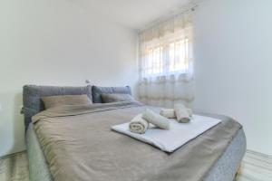 Postel nebo postele na pokoji v ubytování Apartment Luka