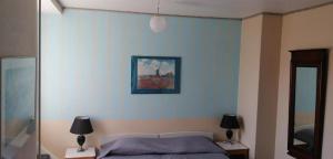 Letto o letti in una camera di Det Gamle Hotel Rudkøbing