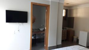 TV a/nebo společenská místnost v ubytování STUDIO CENTRAL IV