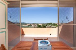 Balkón alebo terasa v ubytovaní Porto Coda Cavallo Beach House a 300 mt dal mare, con terrazza panoramica