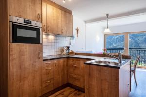 Kuchyň nebo kuchyňský kout v ubytování Thusnelda Apartment A
