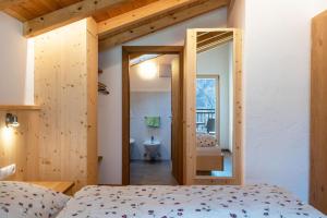 Postel nebo postele na pokoji v ubytování Thusnelda Apartment A