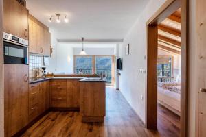 Kuchyň nebo kuchyňský kout v ubytování Thusnelda Apartment A