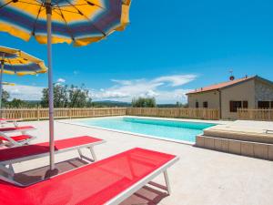 The swimming pool at or close to Holiday Home Melograno-2 by Interhome