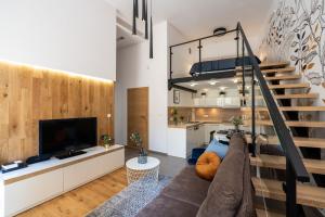 Telewizja i/lub zestaw kina domowego w obiekcie Home Sweet Home
