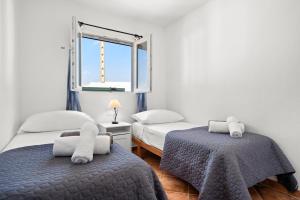 A bed or beds in a room at VILLA XOROI