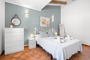 A bed or beds in a room at VILLA XOROI