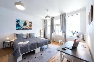 Posteľ alebo postele v izbe v ubytovaní Apartment MERAN